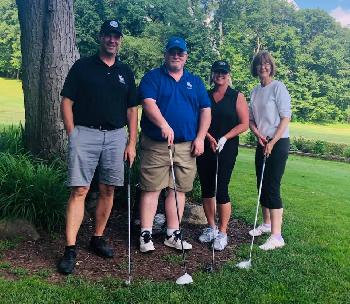 Steve, Jim, Renee and Mary representing BlueOx Credit Union at the Greater Albion Chamber of Commerce and Visitors Bureau Golf Outing.